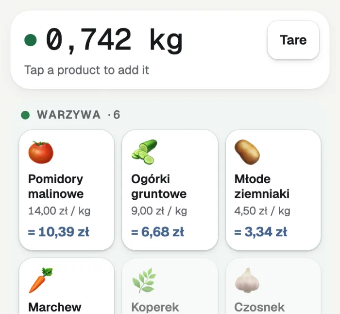 The weight has settled at 0,742 kg; the tomato tile shows the price for it, 10,39 zł.